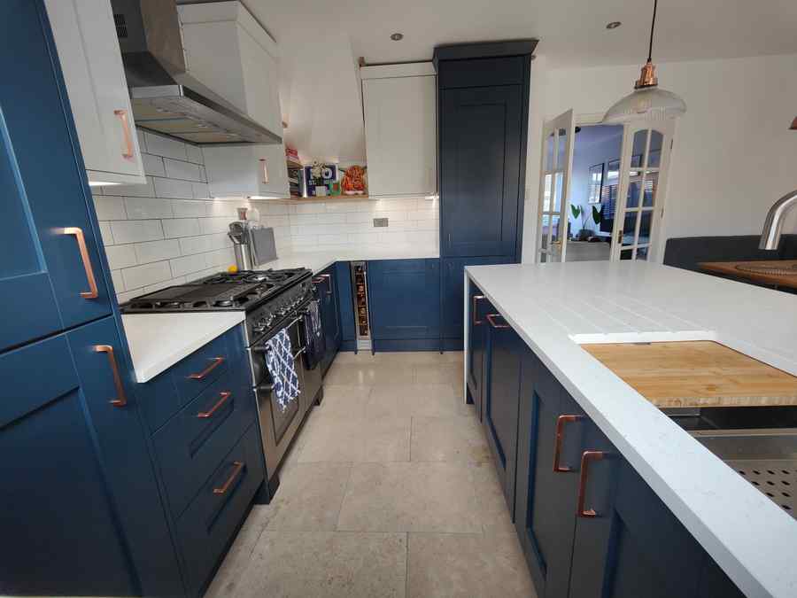 Navy shaker kitchen with copper handles