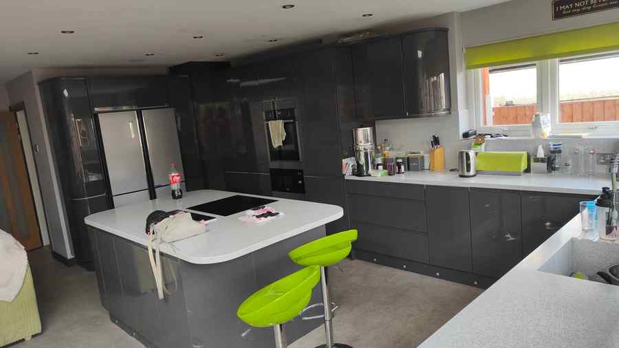 High-gloss graphite kitchen with island