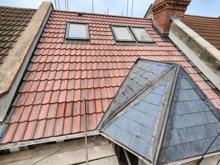 Full re-roof — tiles, slates & flat section