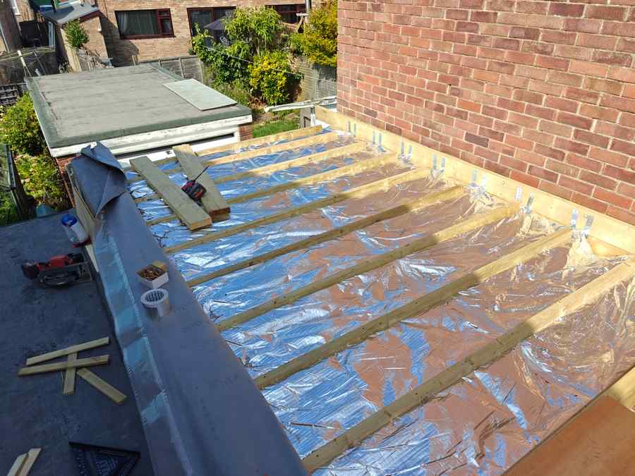 Flat roof rebuild — insulation & timber frame